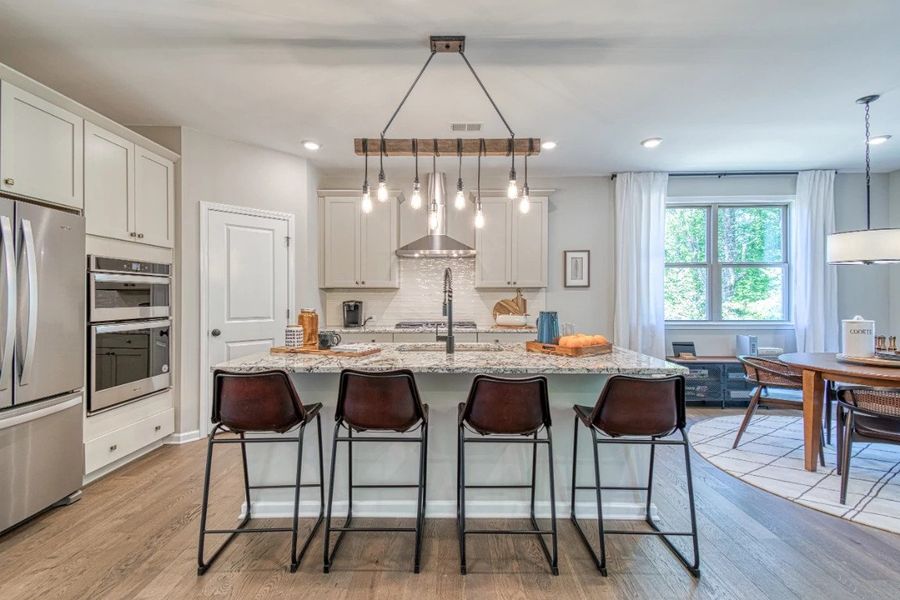 Furnished interior in a model home at Creekside in Dawsonville (Image 19).
