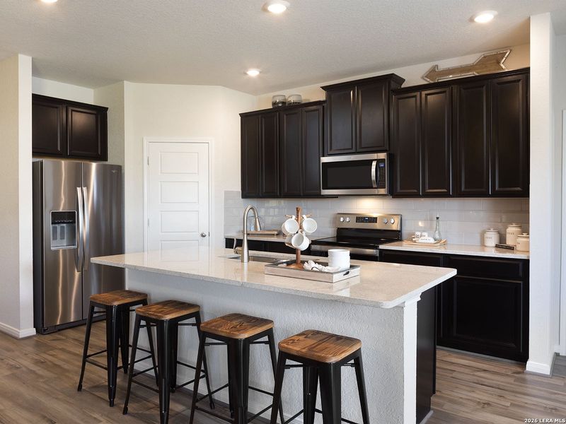 Furnished interior view inside a new home in Legendary Trails - Premier Series, Cibolo (Image 10).