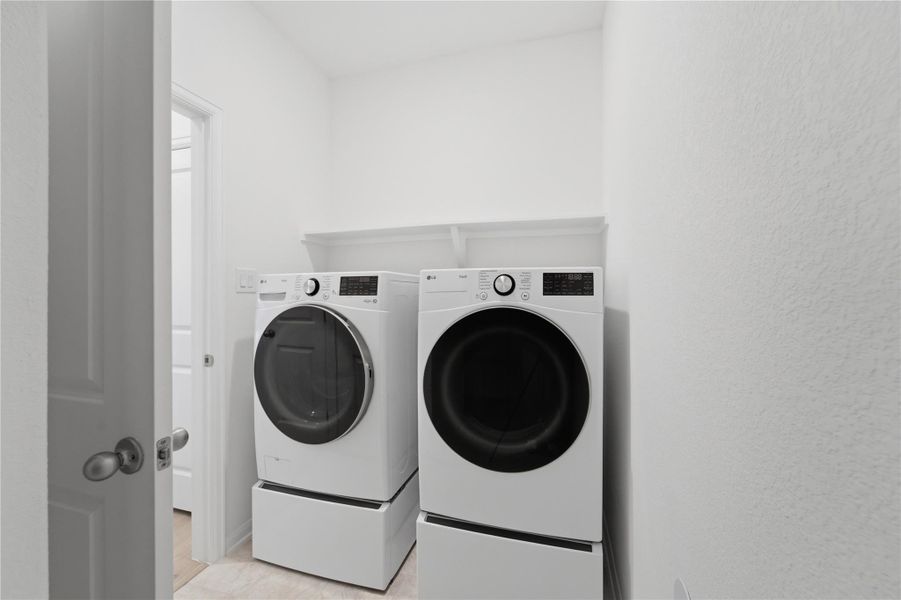 Modern laundry machines offer convenience in a clean, functional utility space. Modern laundry machines offer convenience in a clean, functional utility space.