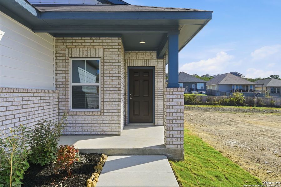 Exterior details and patio area of a home in Hunters Ranch, San Antonio (Image 22).