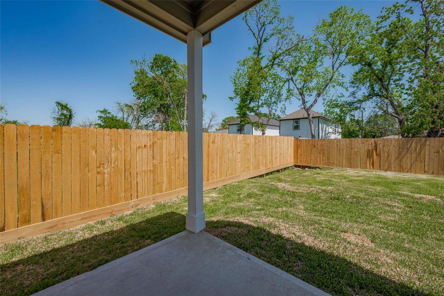 Exterior details and patio area of a home in , Houston (Image 4).