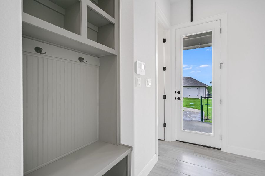 Furnished interior in a model home at Whispering Wind in Bertram (Image 21).