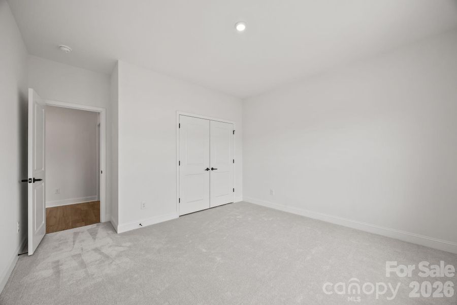 Spacious, unfurnished interior of a new home in The River District Townhomes, Charlotte (Image 21).