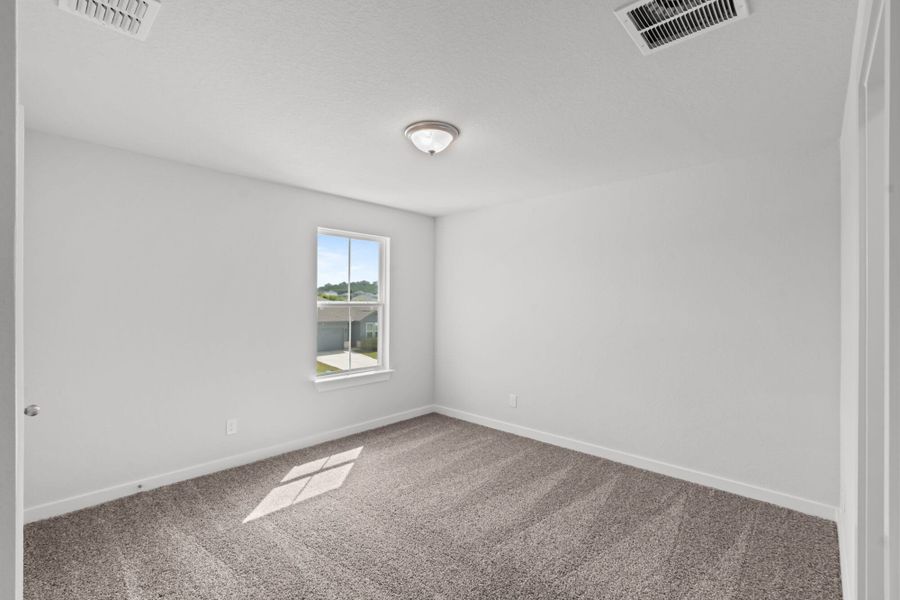 Spacious, unfurnished interior of a new home in The Meadows at Hunters Ranch, San Antonio (Image 28).