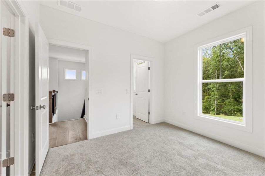 Spacious, unfurnished interior of a new home in Ashbury Commons, Powder Springs (Image 44).
