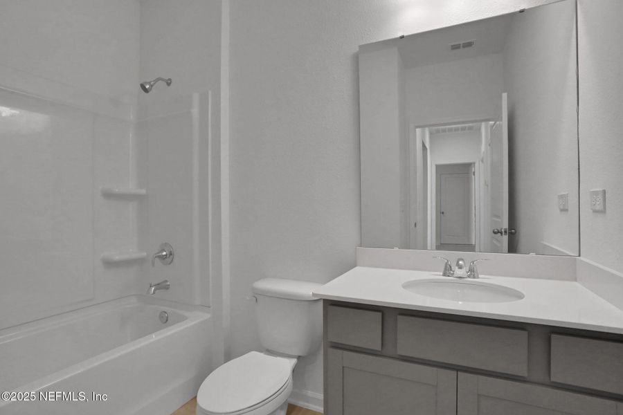 Furnished interior view inside a new home in Bellbrooke, Jacksonville (Image 9). Furnished interior view inside a new home in Bellbrooke, Jacksonville (Image 9).