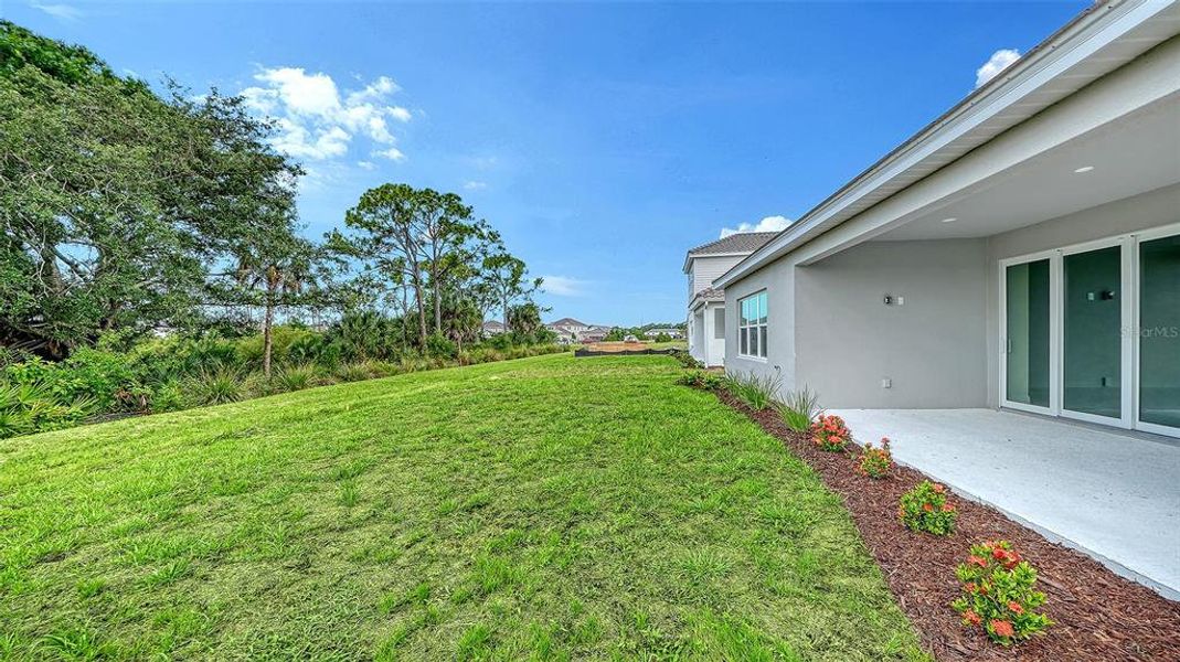 Exterior details and patio area of a home in Grand Park, Sarasota (Image 25).
