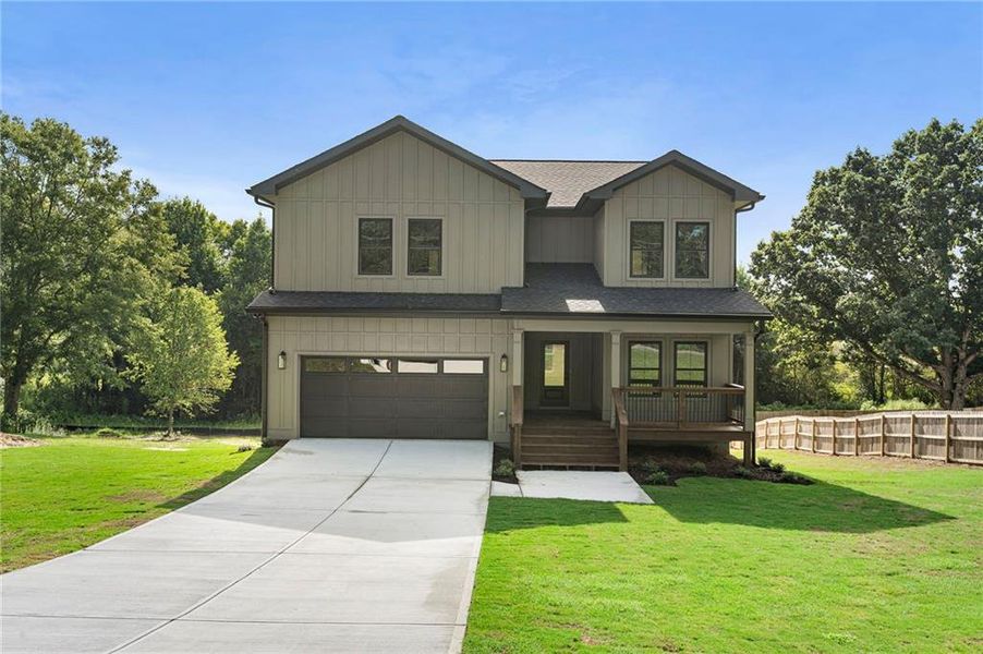 Front exterior of a new home in , Hiram, GA, highlighting curb appeal (Image 24).