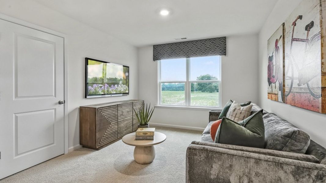 Representative furnished interior of a home built from the HAYDEN by D.R. Horton in Bexford, Willow Spring (Image 29).