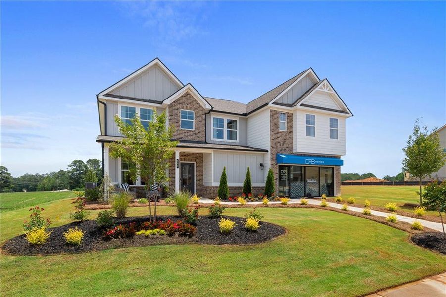 Front exterior of a new home in Grandview at Millers Mill, Stockbridge, GA, highlighting curb appeal (Image 23).