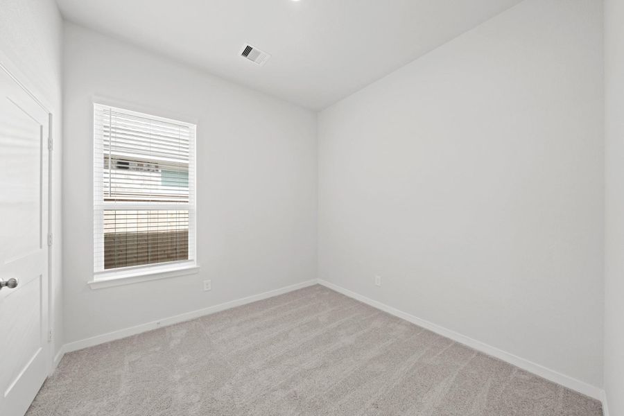 Spacious, unfurnished interior of a new home in Creekland Village at Bridgeland, Cypress (Image 20).