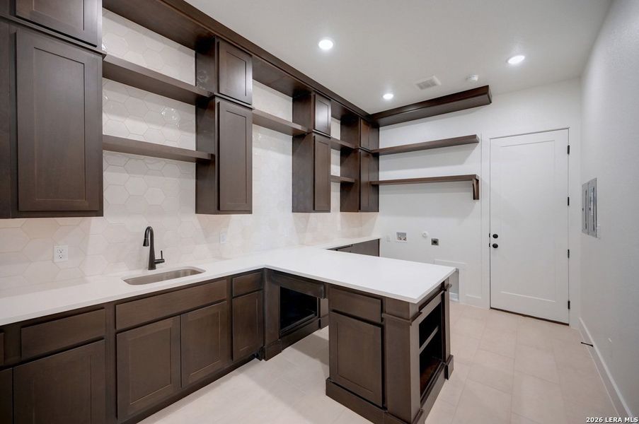 Furnished interior view inside a new home in La Cima, San Marcos (Image 5).