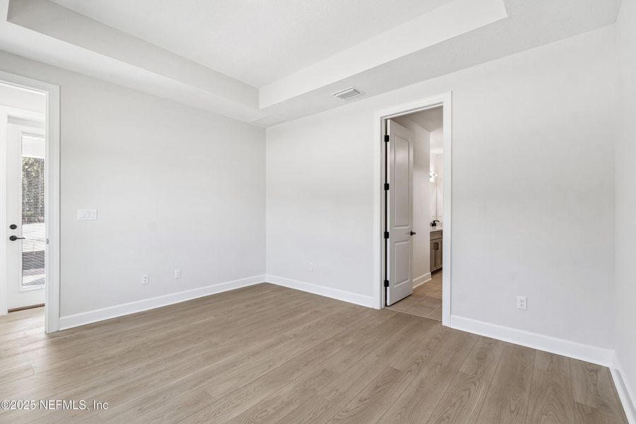Spacious, unfurnished interior of a new home in Evergreen Island at Silverleaf - Classic, St. Augustine (Image 18). Spacious, unfurnished interior of a new home in Evergreen Island at Silverleaf - Classic, St. Augustine (Image 18).
