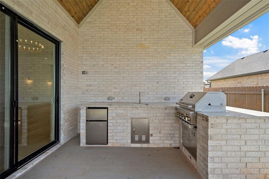 Exterior details and patio area of a home in , Hewitt (Image 29).
