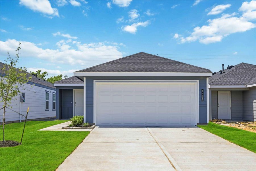 Front exterior of a new home in Legacy Village, Houston, TX, highlighting curb appeal (Image 1). Front exterior of a new home in Legacy Village, Houston, TX, highlighting curb appeal (Image 1).