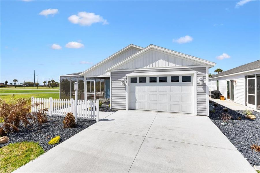Front exterior of a new home in , The Villages, FL, highlighting curb appeal (Image 2). Front exterior of a new home in , The Villages, FL, highlighting curb appeal (Image 2).