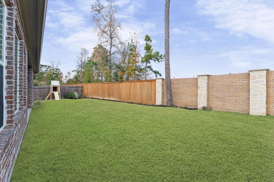 Exterior details and patio area of a home in , Tomball (Image 24).