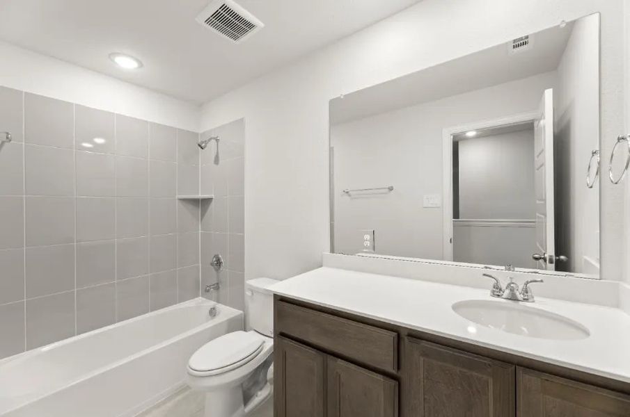 Front exterior of a new home in Sereno Oaks at Buckner Terrace, Dallas, TX, highlighting curb appeal (Image 19).