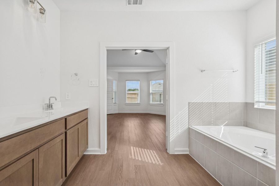 Furnished interior view inside a new home in Pinewood at Grand Texas, New Caney (Image 5). Furnished interior view inside a new home in Pinewood at Grand Texas, New Caney (Image 5).