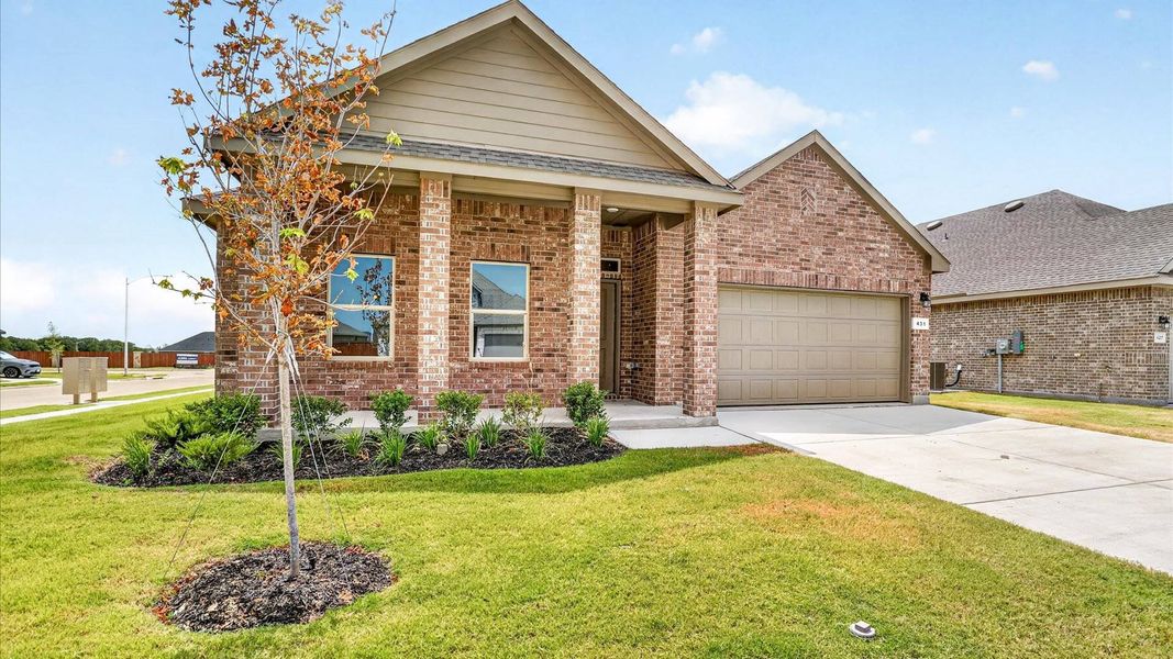 Front exterior of a new home in Saratoga, Granbury, TX, highlighting curb appeal (Image 2).