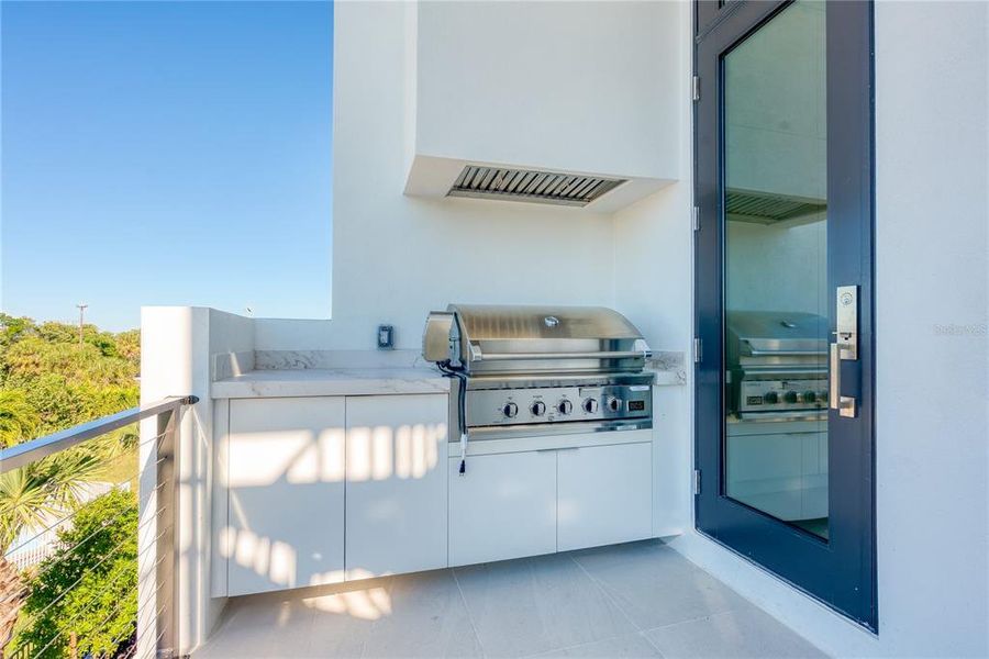 Exterior details and patio area of a home in , Longboat Key (Image 35).