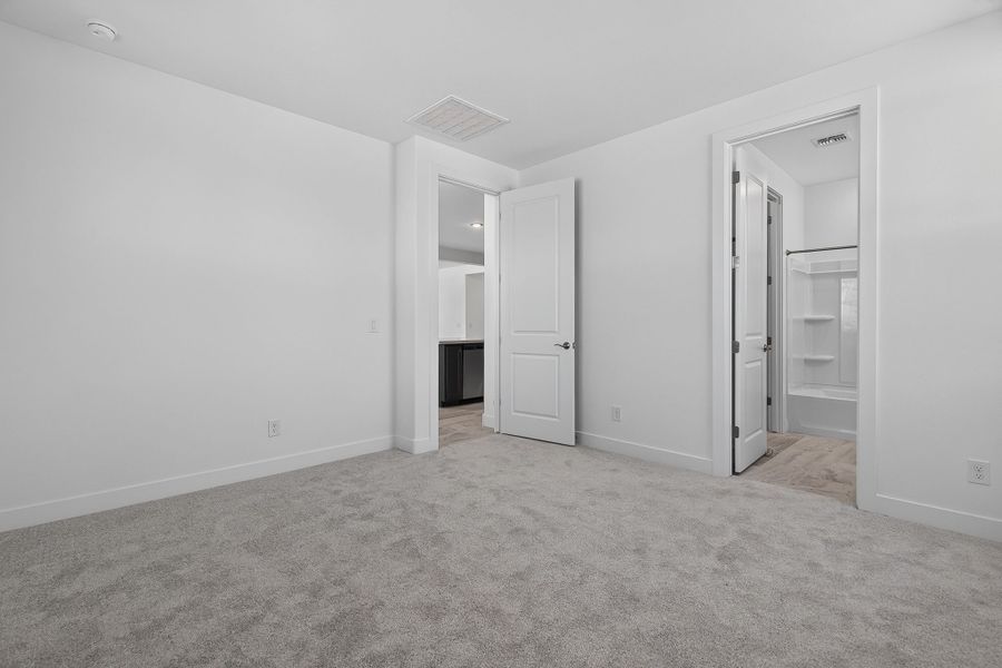 Spacious, unfurnished interior of a new home in The Grove at El Cidro, Goodyear (Image 33).