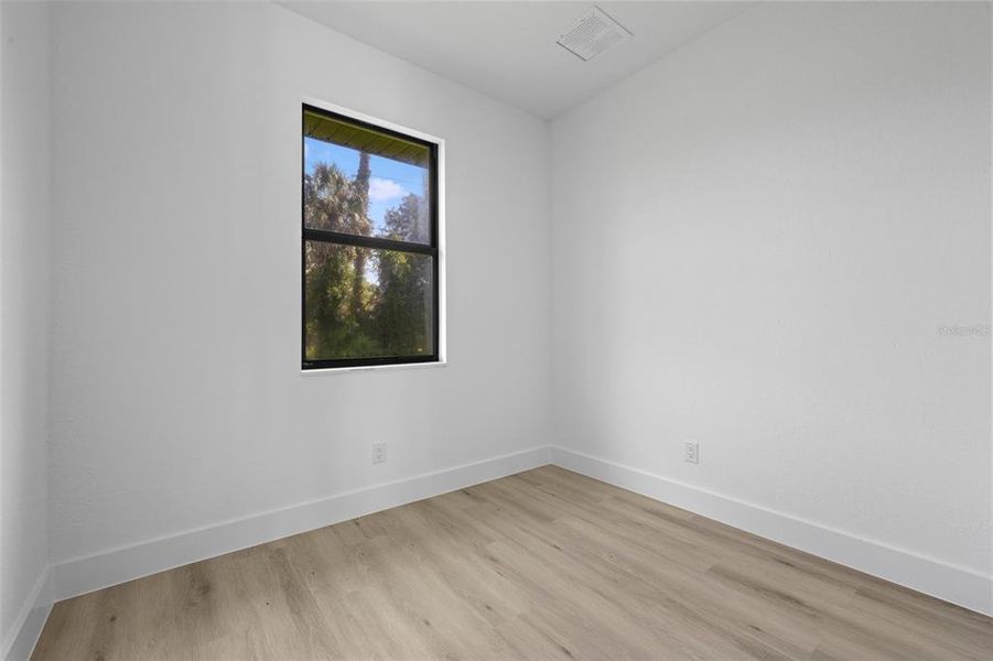 Spacious, unfurnished interior of a new home in , Port Charlotte (Image 11).