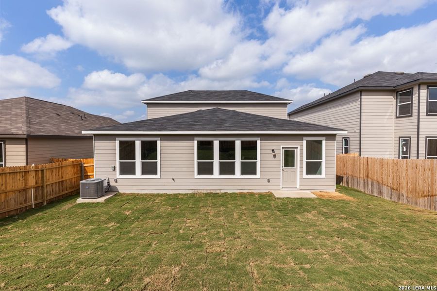 Exterior details and patio area of a home in Hidden Bluffs at TRP, San Antonio (Image 4).