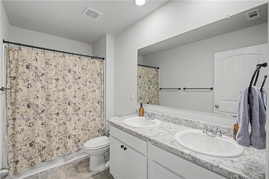 Furnished interior view inside a new home in Oakwood, Dallas (Image 19).