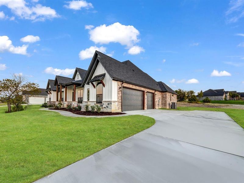 Front exterior of a new home in , Weatherford, TX, highlighting curb appeal (Image 29).