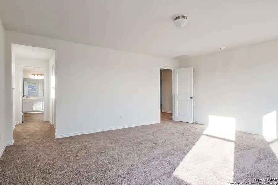 Spacious, unfurnished interior of a new home in Preserve at Culebra - Classic Collection, San Antonio (Image 7). Spacious, unfurnished interior of a new home in Preserve at Culebra - Classic Collection, San Antonio (Image 7).