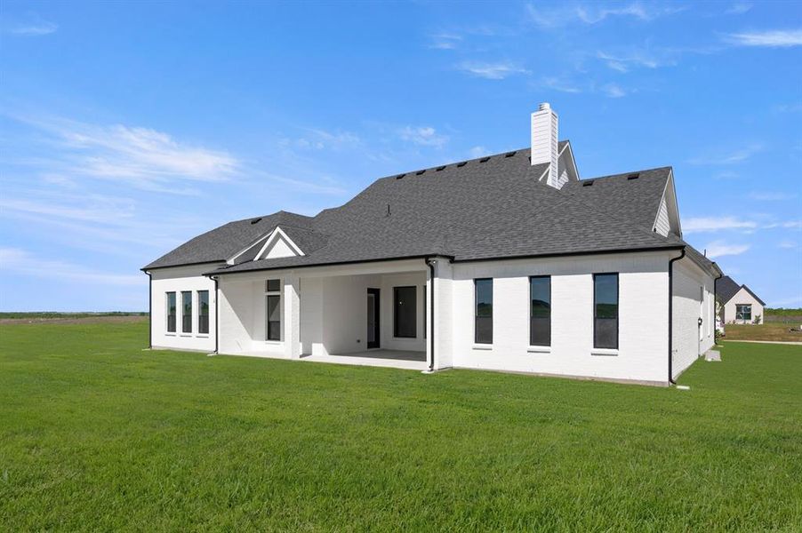 Exterior details and patio area of a home in Byrum Ranch - 1 Acre Lots, Venus (Image 3).