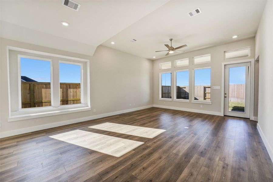 Spacious, unfurnished interior of a new home in Sunterra, Katy (Image 18).