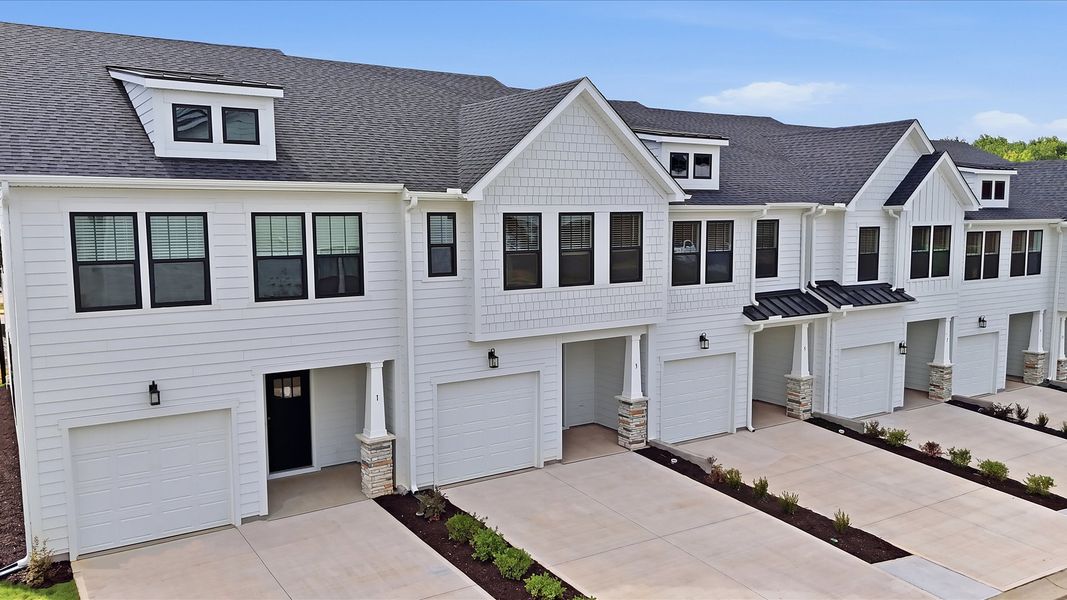 Front exterior of a new home in Gresham Station, Simpsonville, SC, highlighting curb appeal (Image 22).