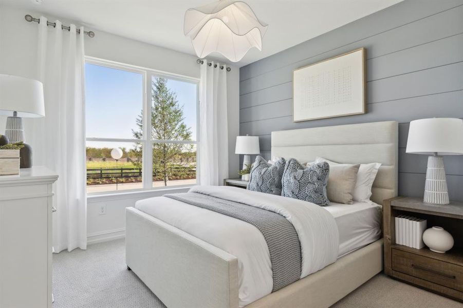 *Model Representation - Spacious secondary bedroom with large windows