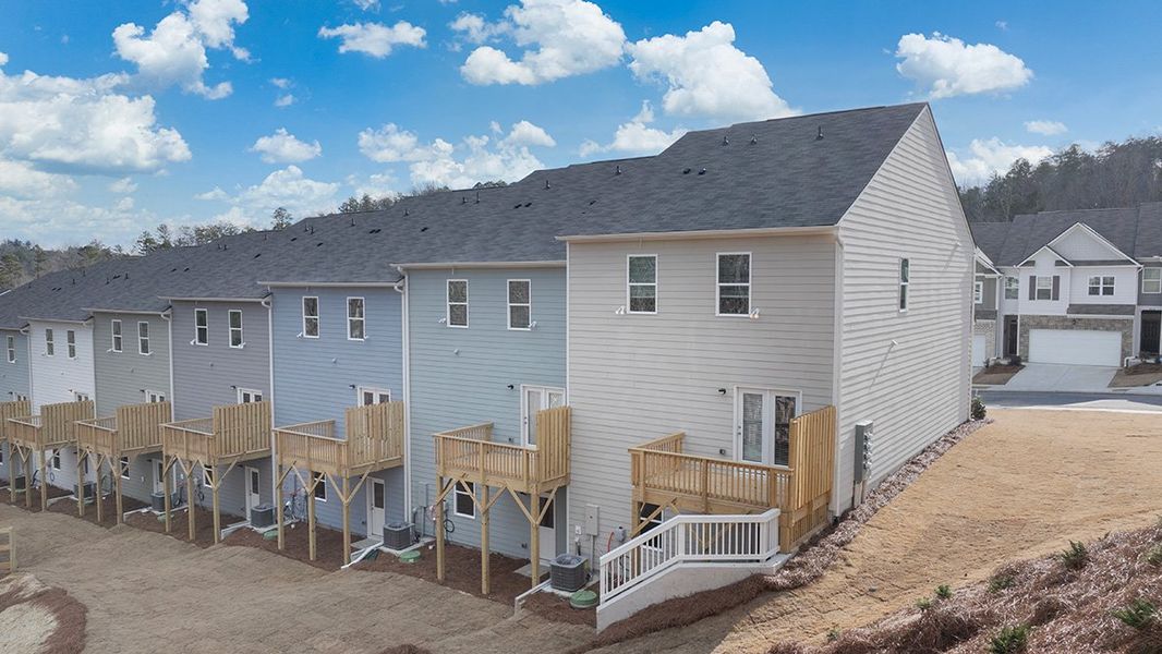 Exterior details and patio area of a home in Greyton Springs Place, Buford (Image 21).