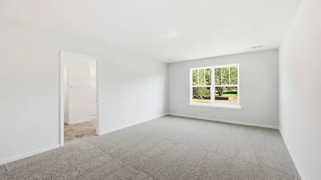 Spacious, unfurnished interior of a new home in Ben Hurt Road, Lyman (Image 34).