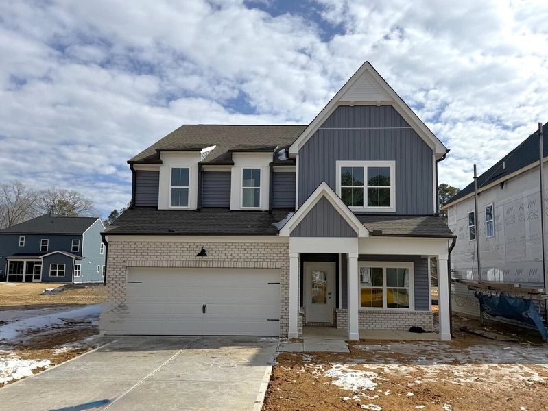 Exterior  - Earthy and warm tones feel rooted in place.