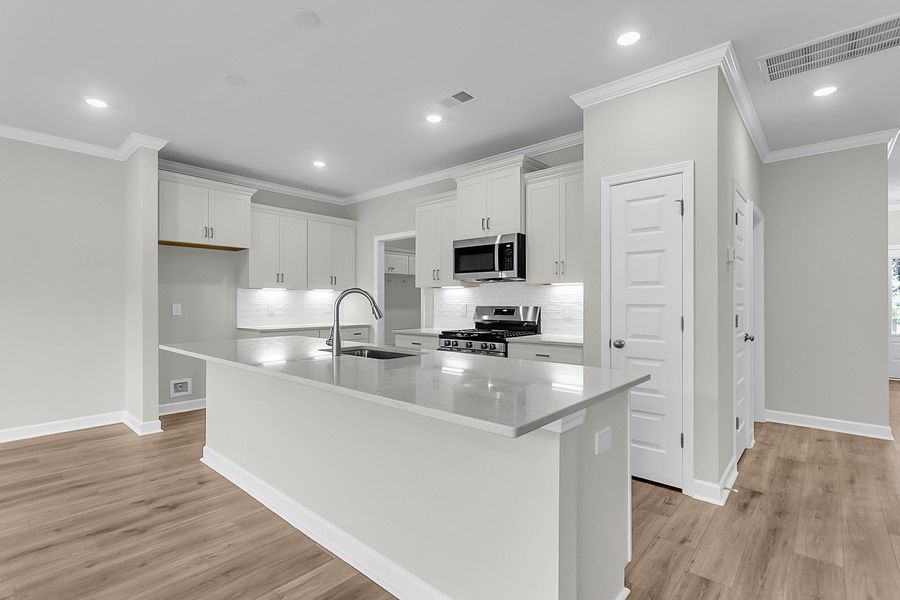 Furnished interior view inside a new home in Pineland Preserve, Summerville (Image 7).