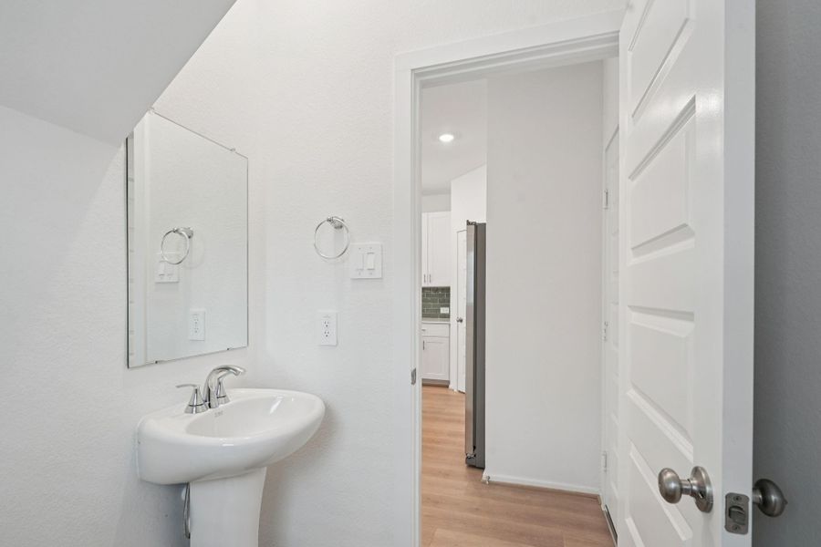 Furnished interior view inside a new home in Kemah Crossing - City Series, Kemah (Image 11).