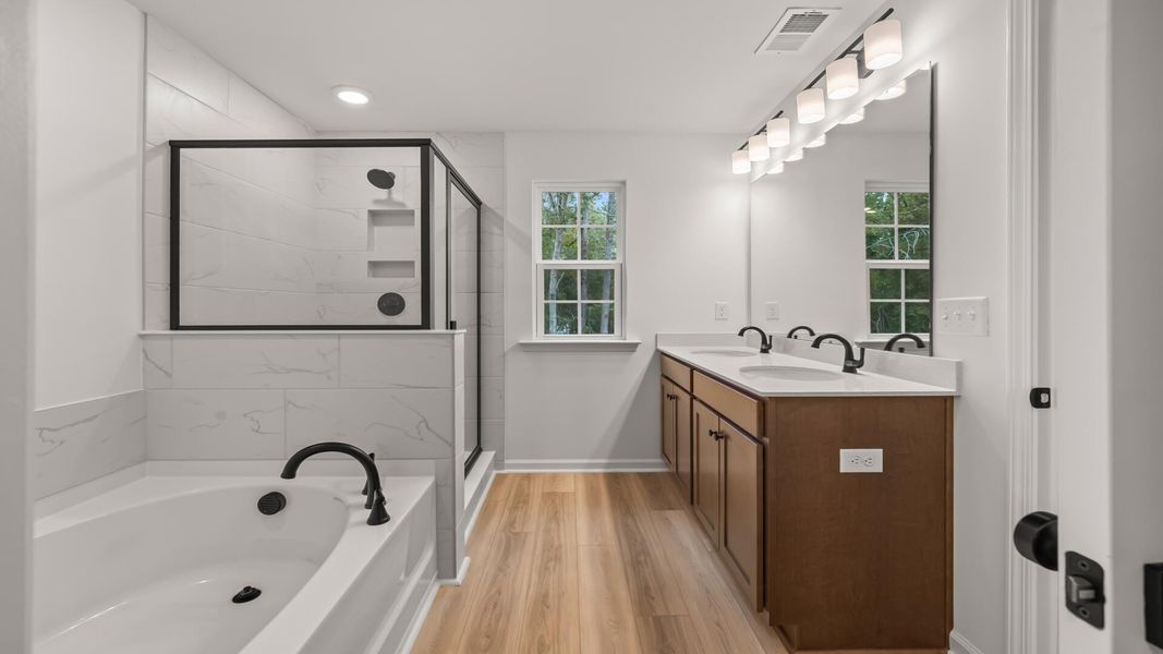 Furnished interior view inside a new home in Creekside at Andrews, Summerville (Image 9). Furnished interior view inside a new home in Creekside at Andrews, Summerville (Image 9).