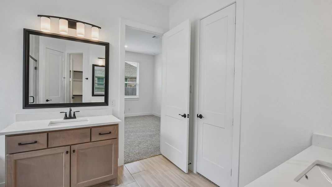 Furnished interior view inside a new home in Artavia, Conroe (Image 13).