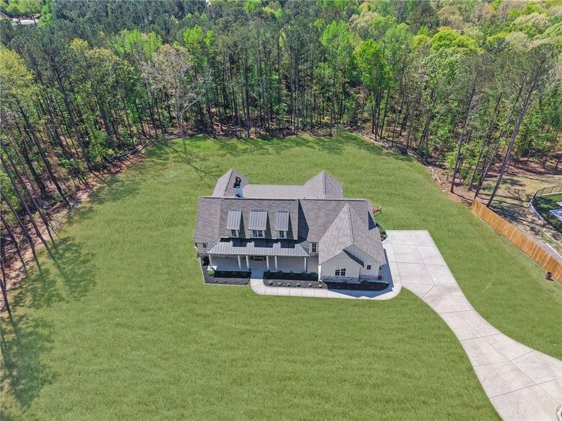 Front exterior of a new home in , Monroe, GA, highlighting curb appeal (Image 30).