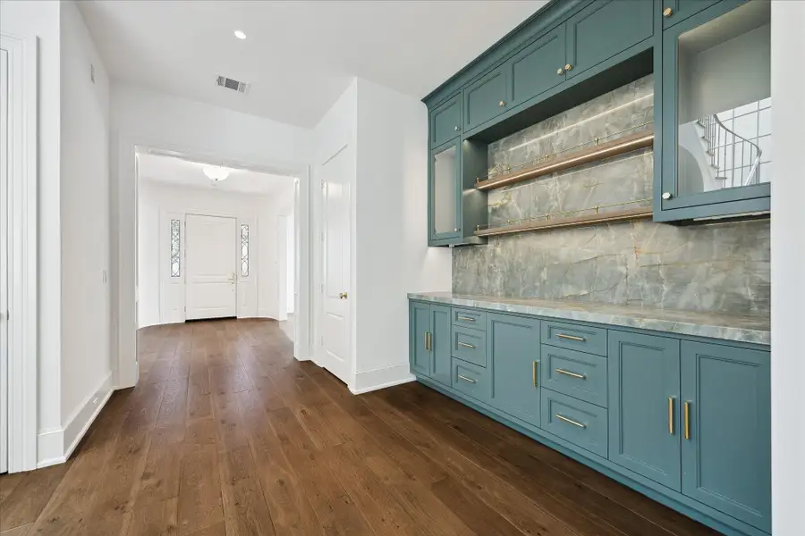 Stunning bar area that can be converted to a wet bar and add a small wine fridge. Stunning bar area that can be converted to a wet bar and add a small wine fridge.