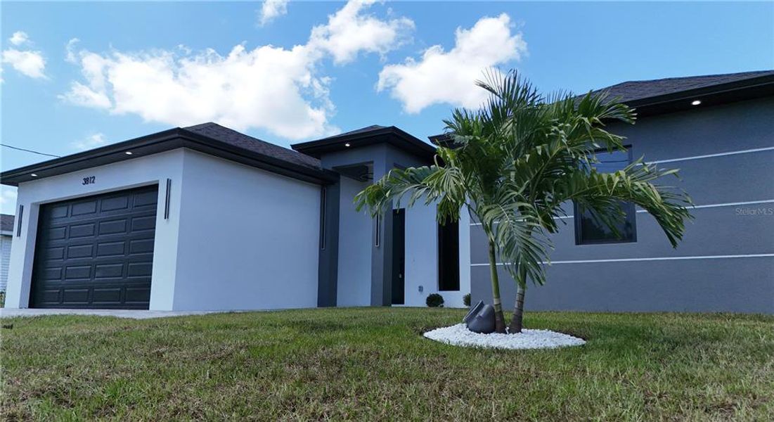 Exterior details and patio area of a home in , Lehigh Acres (Image 21). Exterior details and patio area of a home in , Lehigh Acres (Image 21).