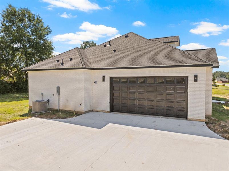 Front exterior of a new home in , Mount Pleasant, TX, highlighting curb appeal (Image 25). Front exterior of a new home in , Mount Pleasant, TX, highlighting curb appeal (Image 25).