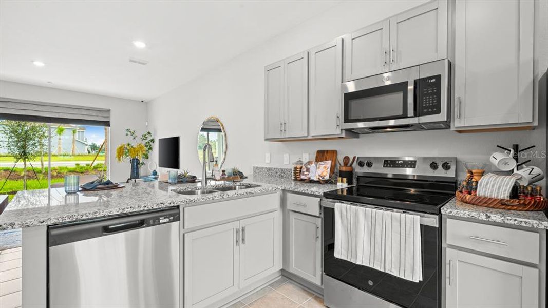 Furnished interior view inside a new home in Westview Community Group Page, Kissimmee (Image 11).