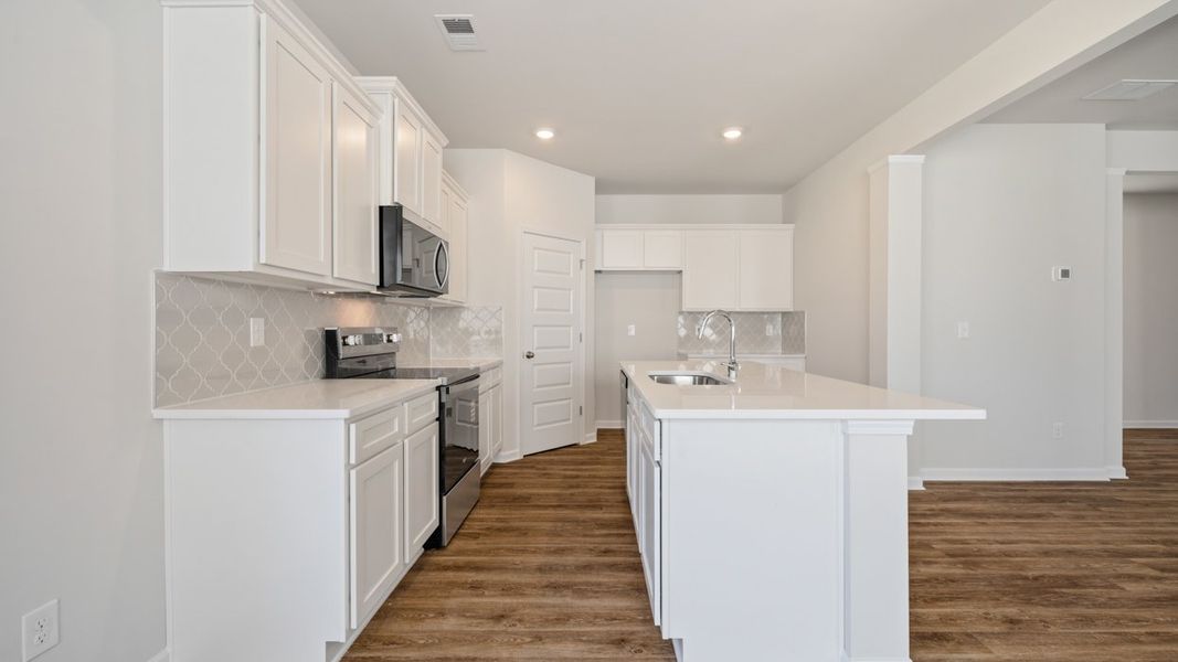 Furnished interior view inside a new home in Shoal Creek, Hampton (Image 5).