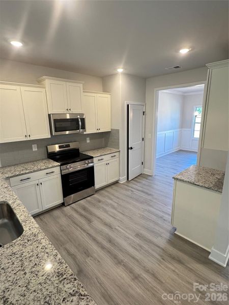 Furnished interior view inside a new home in Kerns Ridge, Salisbury (Image 4).