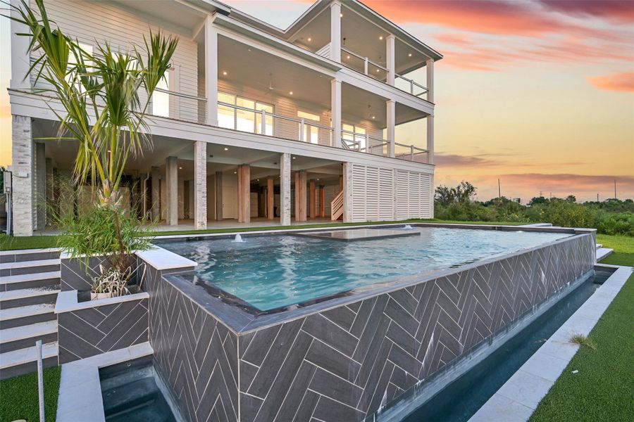 Exterior details and patio area of a home in , Galveston (Image 3).